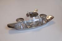 Wilhelm Wagenfeld, Salzgestell, 1963  
 Salt and Pepper Shaker, Mustardpot, Tray, 26,5 × 8 cm   Wagenfeld Collection Kroll  
© VG Bild-Kunst, Bonn, 2025  
 Photo: Kunstmuseen Krefeld