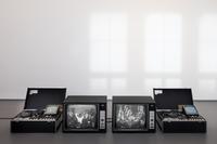 Joseph Beuys & Henning Christiansen  
Celtic + ~~~~, 1971  
Videoinstallation, 2 Monitore, 2 Shibaden t9-Videoabspielgeräte, 7 Memorex-Videobänder, schwarzweiß, Band a, links 253 min, Band b, rechts 219 min  
Kunstmuseen Krefeld  
© VG Bild-Kunst, Bonn 2022 / Foto: Dirk Rose / Kunstmuseen Krefeld
